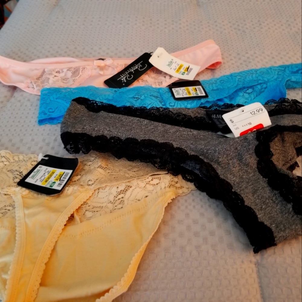SOLD Four pair of brand new Stein Mart thongs size XL. Purchased for my sister.
